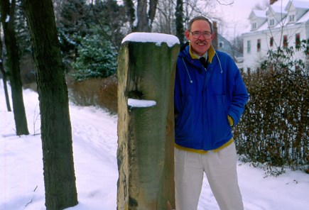 Don Janzen standing at the Shaker gatepost in the snow in Cuyahoga County, OH, January 30, 1994. Source: Donald E. Janzen Collection (CS 662, 015sc-0012)