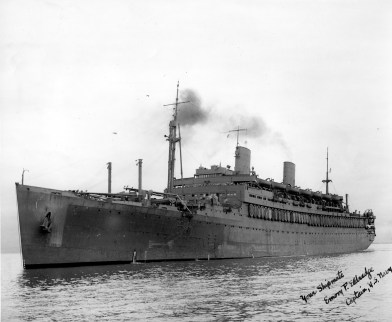 USS Mt. Vernon, photograph signed "Your shipmate, Emory P. Eldredge, Captain, U.S. Navy" "USS Mount Vernon (AP-22) was a troop transport that served with the United States Navy during World War II. Prior to her military service, she was a luxury ocean liner named SS Washington, 1945. Source: Charles LaFollette collection, MSS 005-021.
