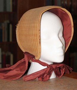 Shaker bonnet replica, 1800's. This bonnet is located in the Communal Studies Reading Room in RL 3024.