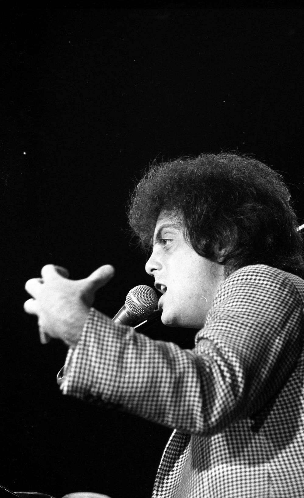 Billy Joel performing at Roberts Stadium on April 24, 1979. Source: Greg Smith Collection at University of Southern Indiana (MSS 034-2986).