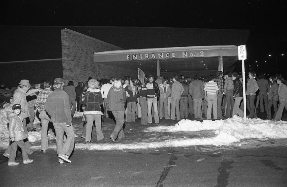 People standing in line for the Kiss Concert at Roberts Stadium, 1978.