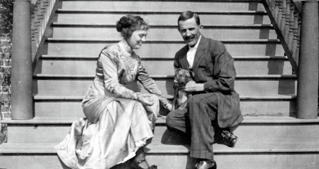Man and woman with small dog